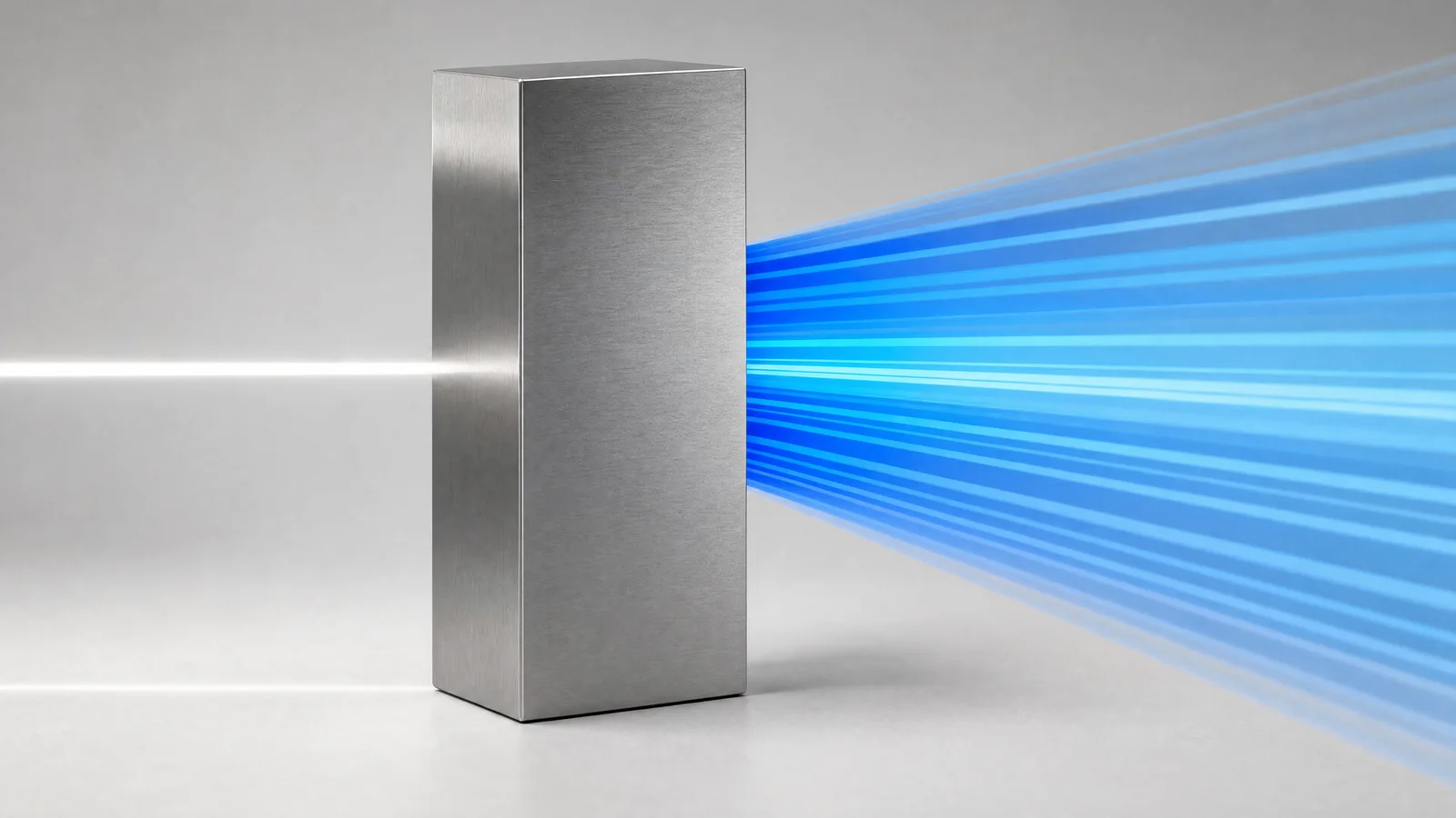 A single beam of white light entering one face of a milled steel block and leaving the other separated into many distinct ribbons of blue, each a different width, fanning apart and running off the frame.